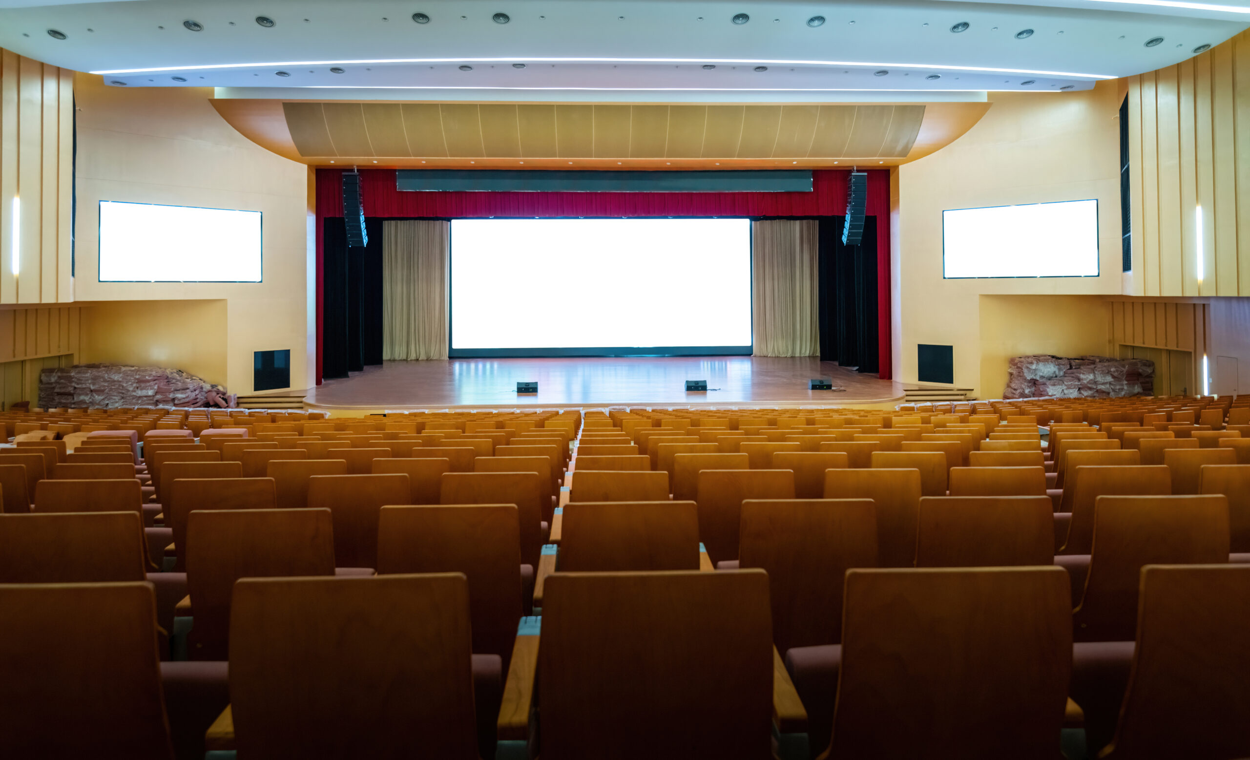 Empty auditorium with many chairs
