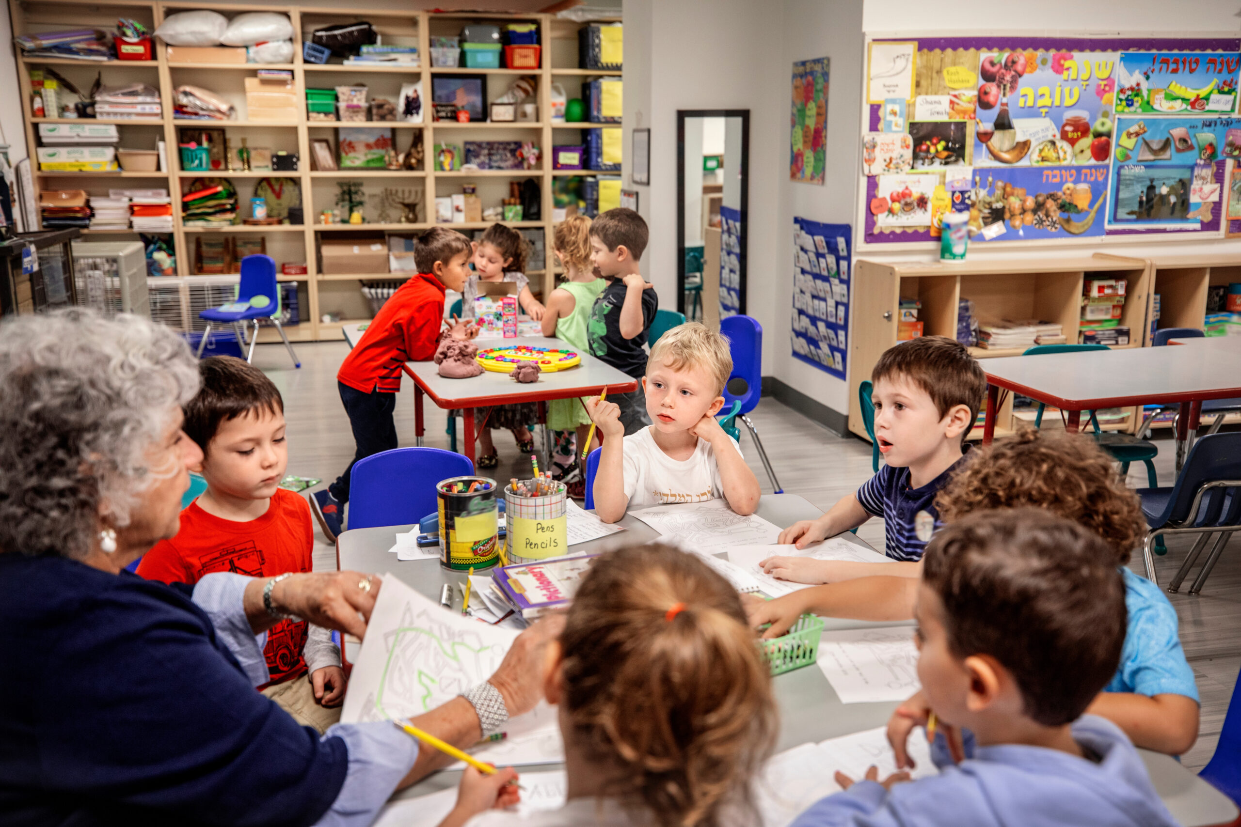 Teacher and children in a classroom